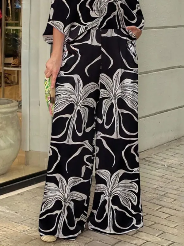 Half Sleeves High Waisted Printed V-Neck Jumpsuits